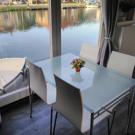 B&boathouse With Bikes And Motorboat