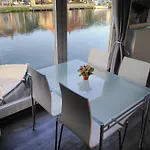 B&boathouse With Bikes And Motorboat