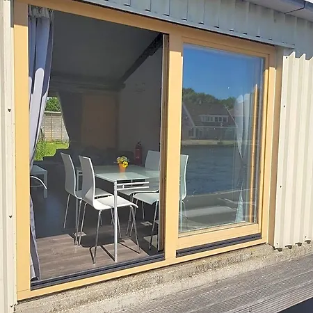 B&boathouse With Bikes And Motorboat