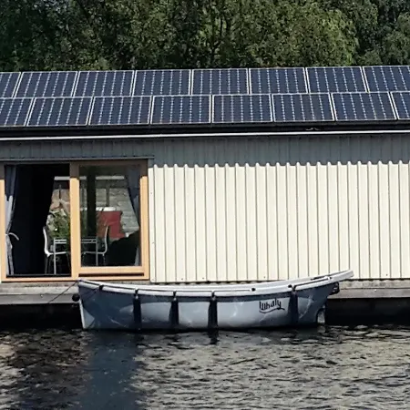 B&boathouse With Bikes And Motorboat Amsterdam